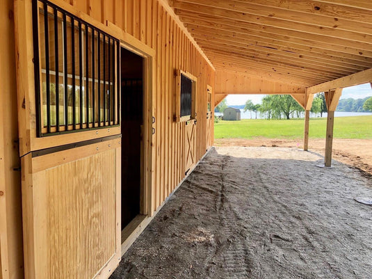 Choosing the Right Flooring and Bedding for Horse Stalls: Essential Considerations for Your New Horse Barn